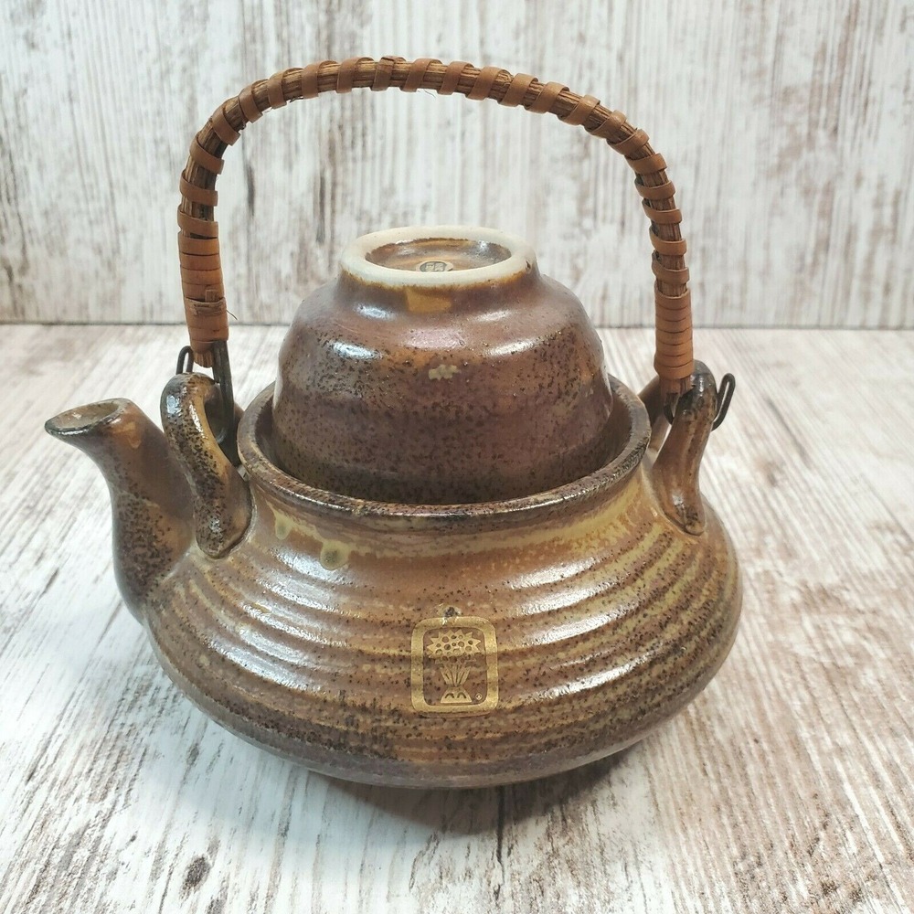 Vtg Small Pottery Teapot w/ Tea cup Lid Rattan Handle Made In Japan Stamped Logo
